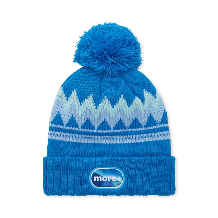 Bonnet jacquard en acrylique à motifs personnalisés avec revers en tricot côtelé 3*1 et pompon.